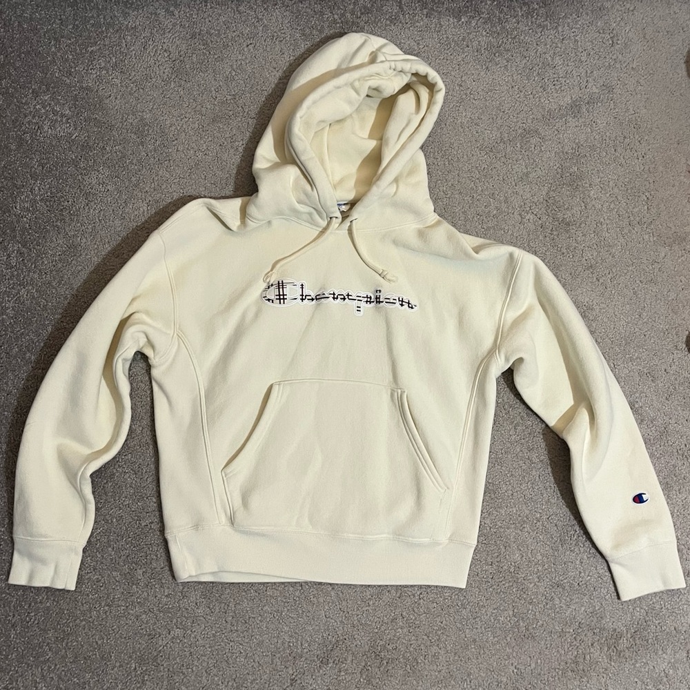 cream colored champion sweatshirt